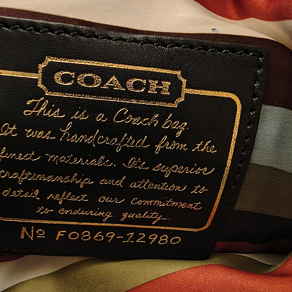 Coach Black Leather Men's Bag with Gold Detailing